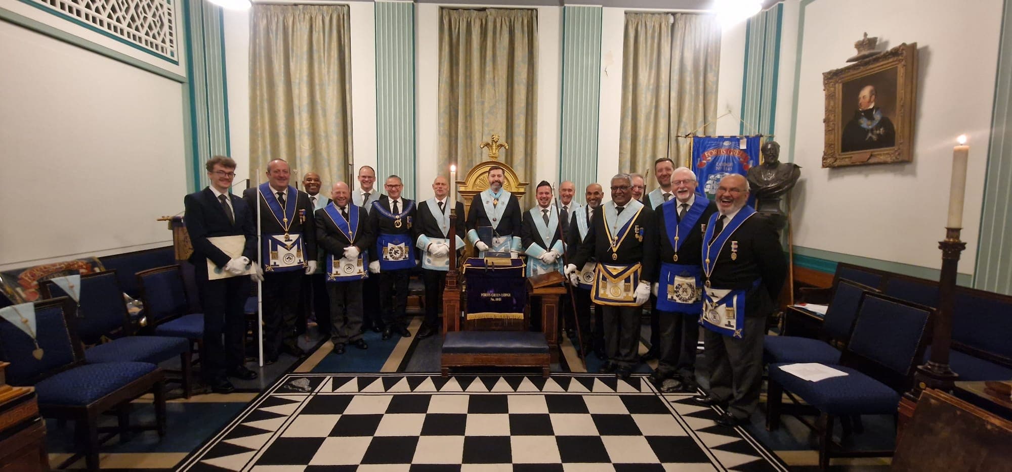 Lodge members gathered in regalia in the ceremony room